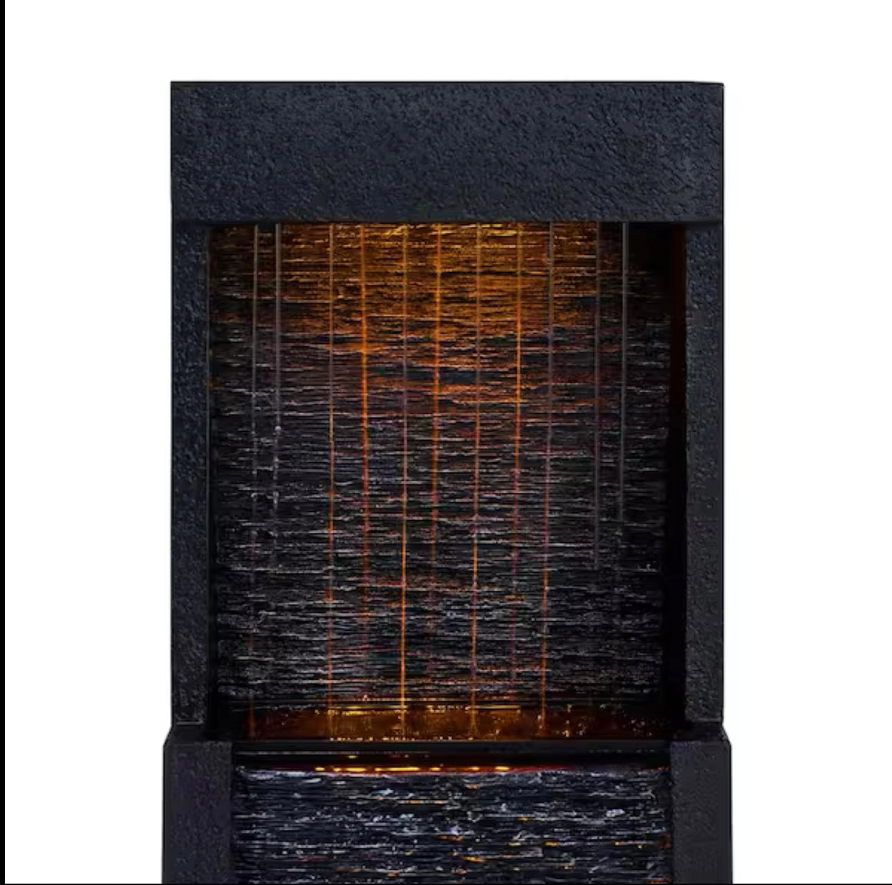 38-Inch solar-powered gray slate waterfall fountain with LED lights placed in an outdoor garden setting, featuring a modern rectangular design with water cascading down the slate surface.