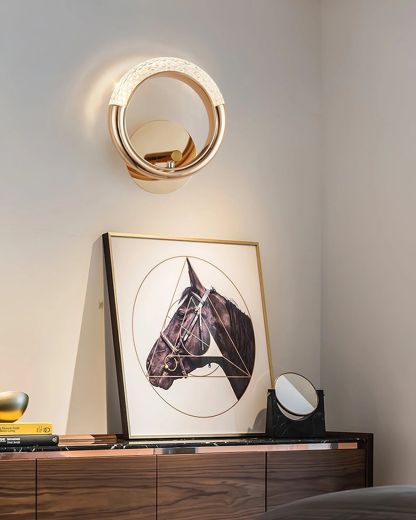 Luxurious metallic wall lamp with adaptable angle and rotatable design, mounted on a wooden wall, illuminating the space with stylish lighting.