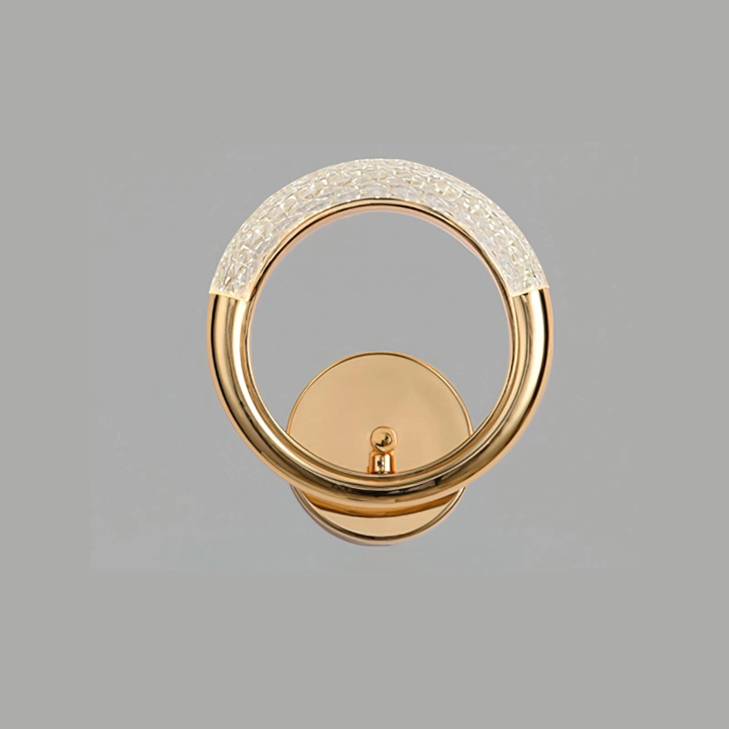 Luxurious metallic wall lamp with an adaptable angle and rotatable design, mounted on a wooden surface, featuring a circular, modern aesthetic.