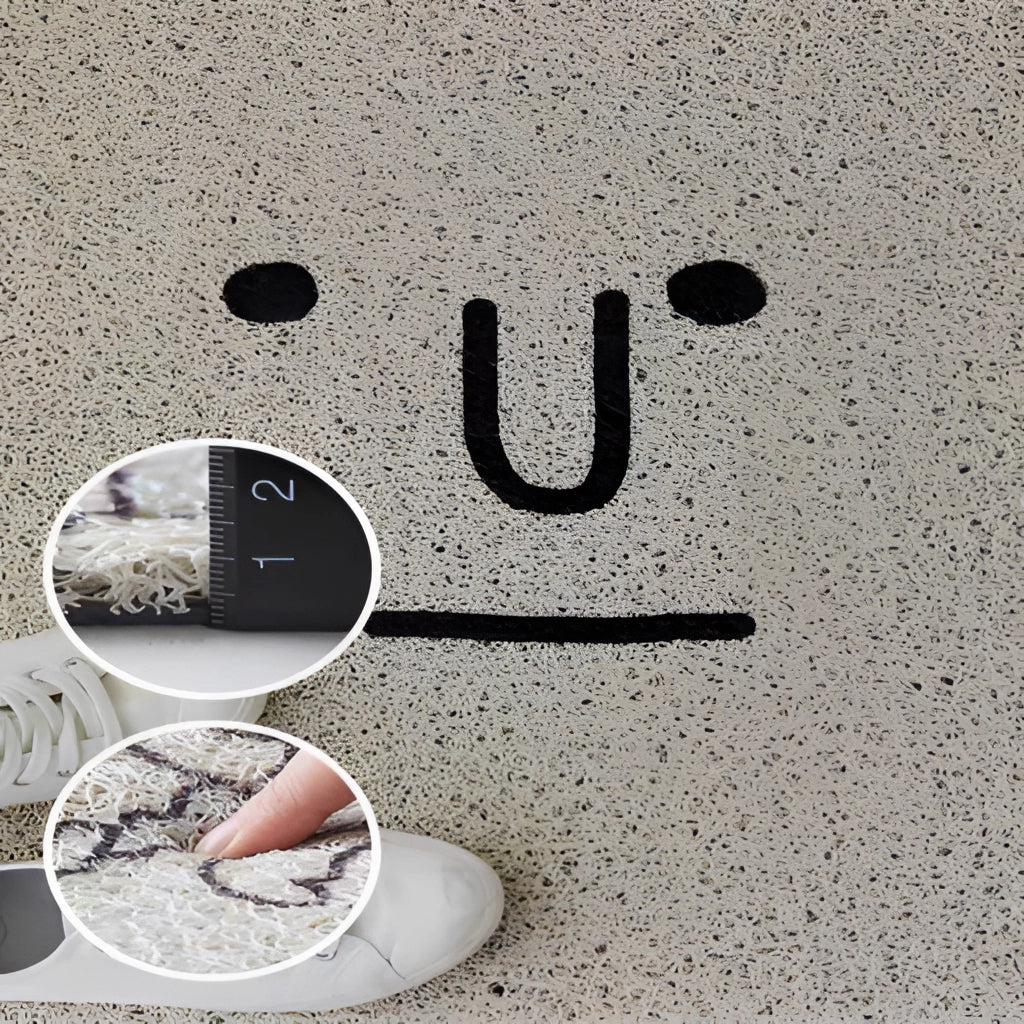 A colorful cartoon design rug featuring a large, happy face with big eyes, suitable for indoor and outdoor use in various sizes.