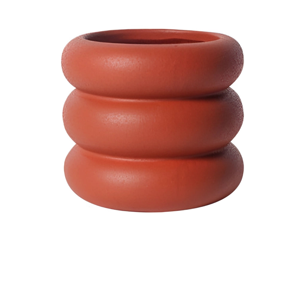 Large red ceramic round plant pot.