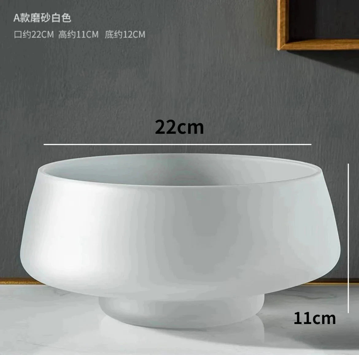Coffee-colored frosted glass vase with a transparent finish placed on a table.