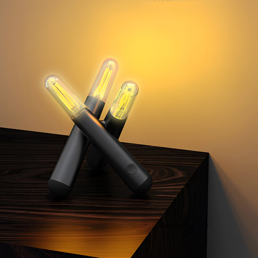 Cordless Kinetic Rotation LED Table Lamp with clear design on a wooden table.
