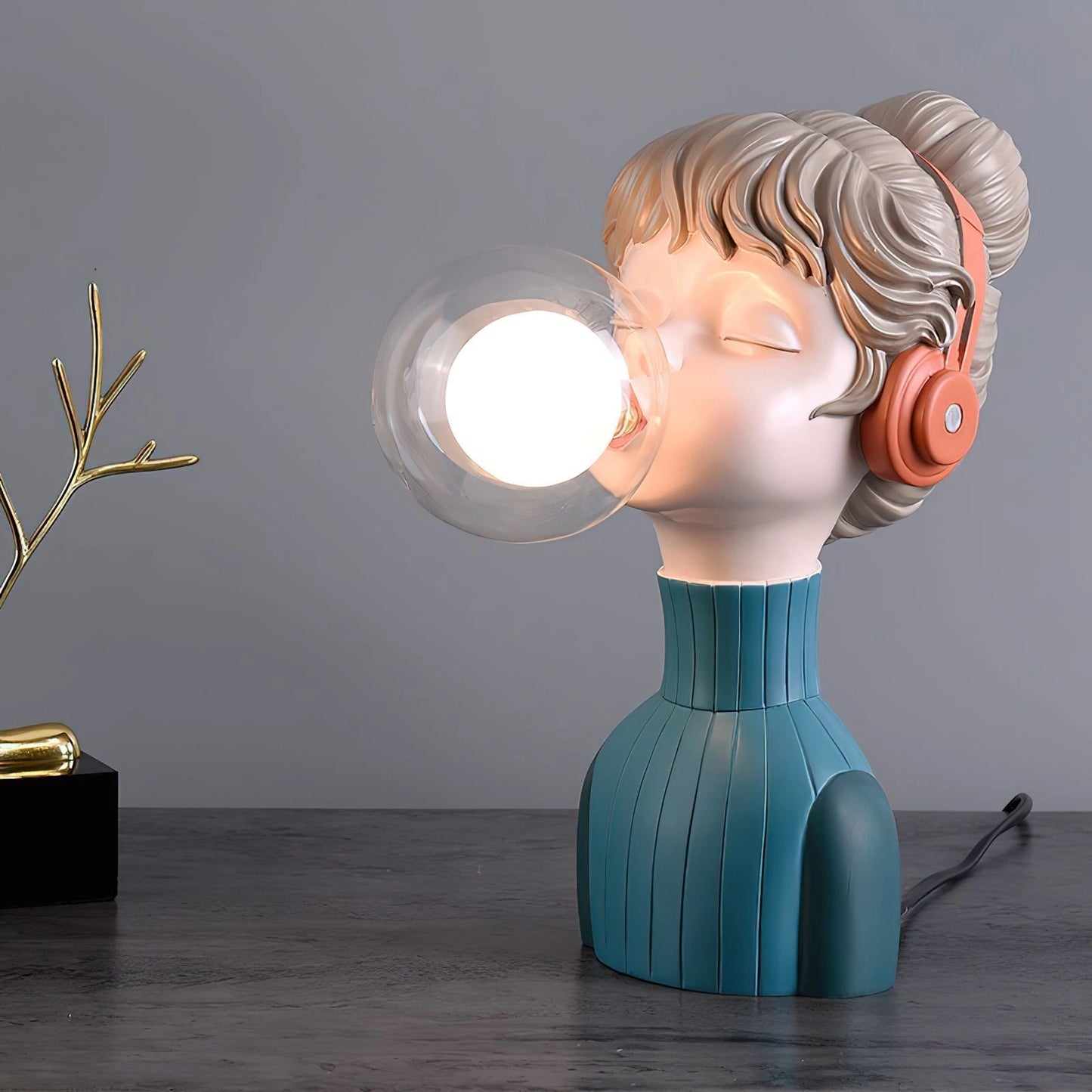 Chic minimalist orange and green desk lamp with resin series design, dimensions ∅ 3.9″ x W 4.7″ x H 12.2″, displayed on a wooden surface.