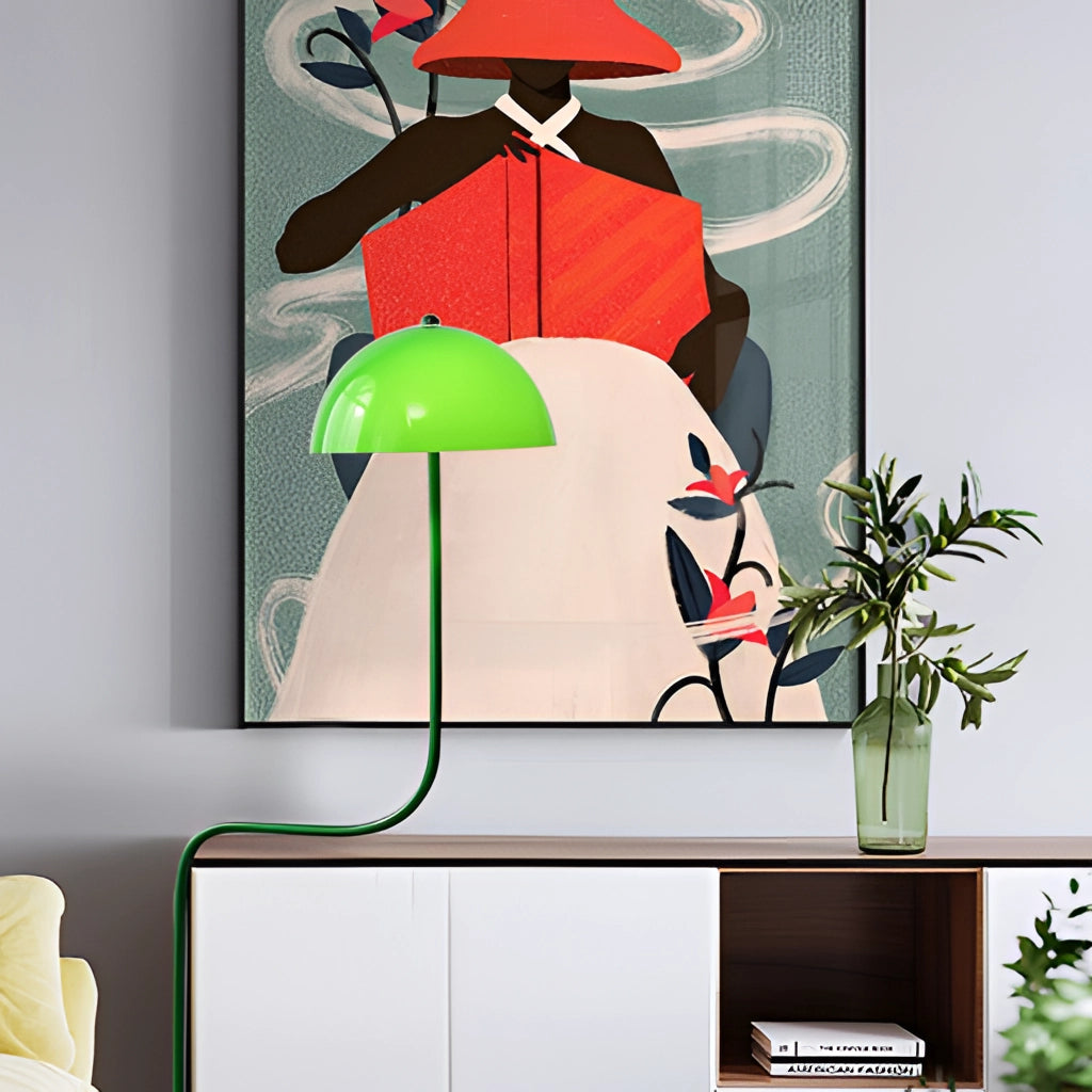 Floor lamp with organic design and quality craftsmanship, featuring a tricolor light in green, white, and carmine, placed next to a green houseplant in a flowerpot within a stylish, modern interior.