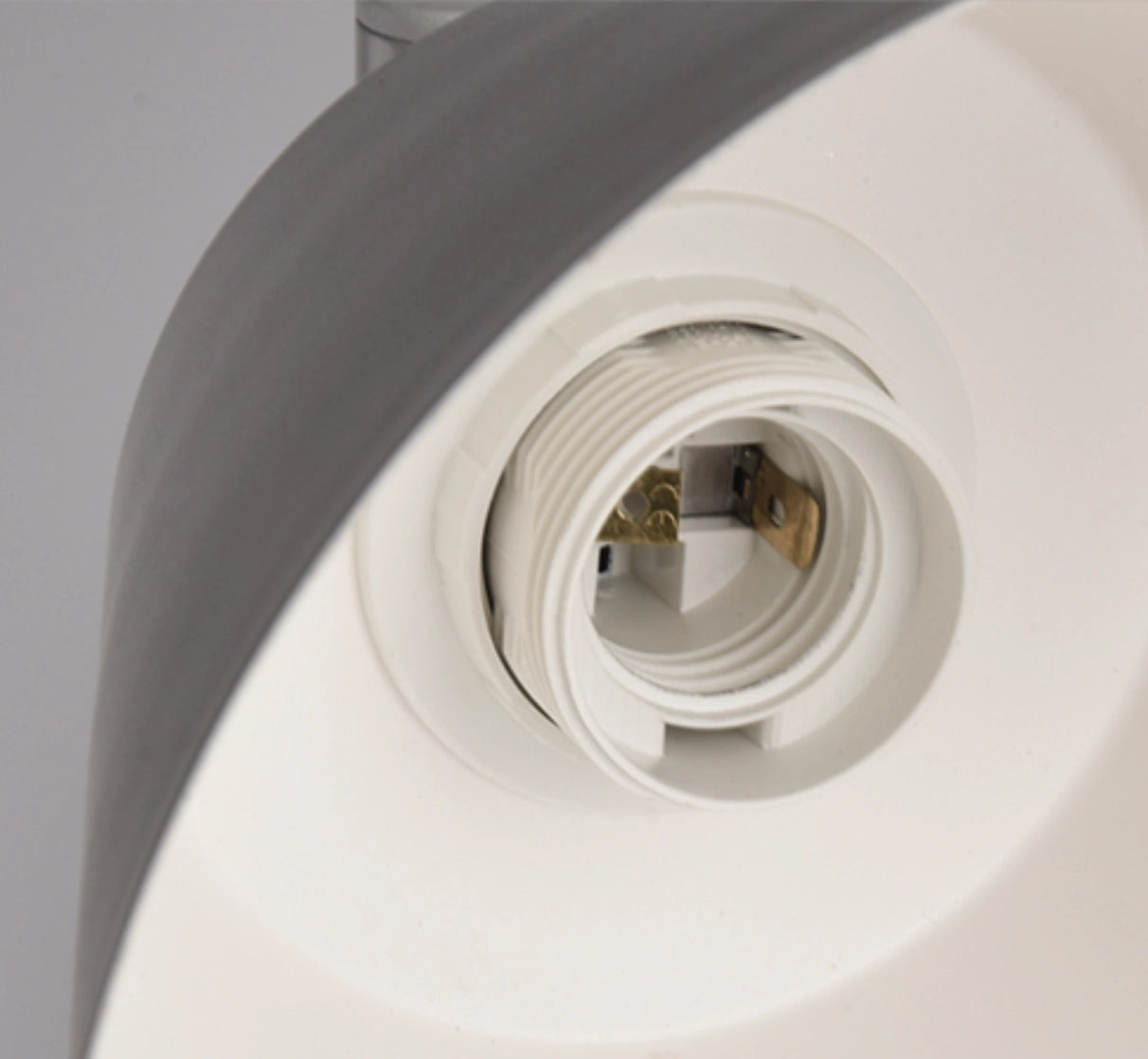 Floor lamp with a sleek design, featuring a marble base and versatile lighting options, placed in a modern setting.