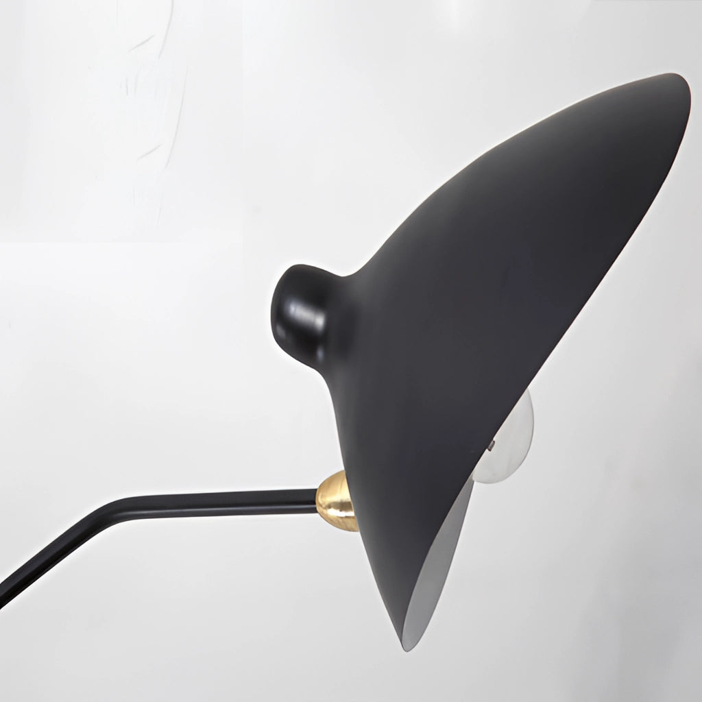 Modern floor lamp with a tripod base and adjustable directional light, featuring a sleek metal and wood design.
