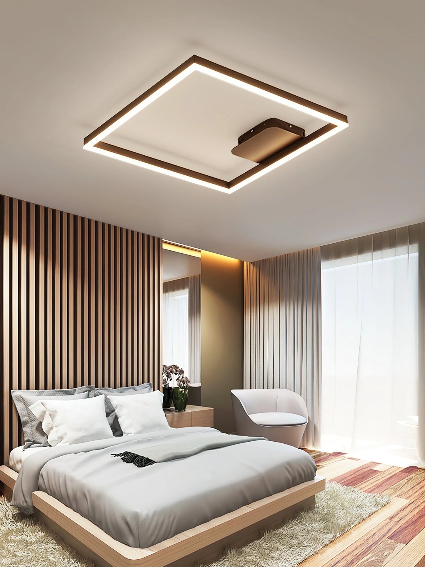 Modern artistic geometric aluminum pendant light with LED technology hanging in a stylishly designed interior with wood accents.
