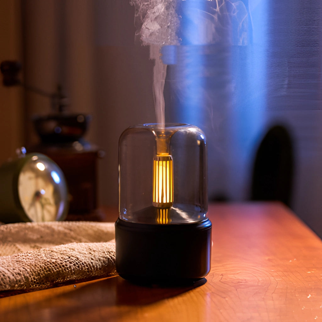 LED Aromatherapy Diffuser with Candle Light Effect on a wooden table, illuminating a room with soft, ambient lighting.