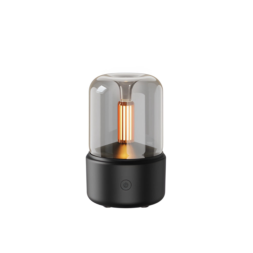 LED Aromatherapy Diffuser with Candle Light Effect, cylindrical shape, emits a warm candle-like glow.