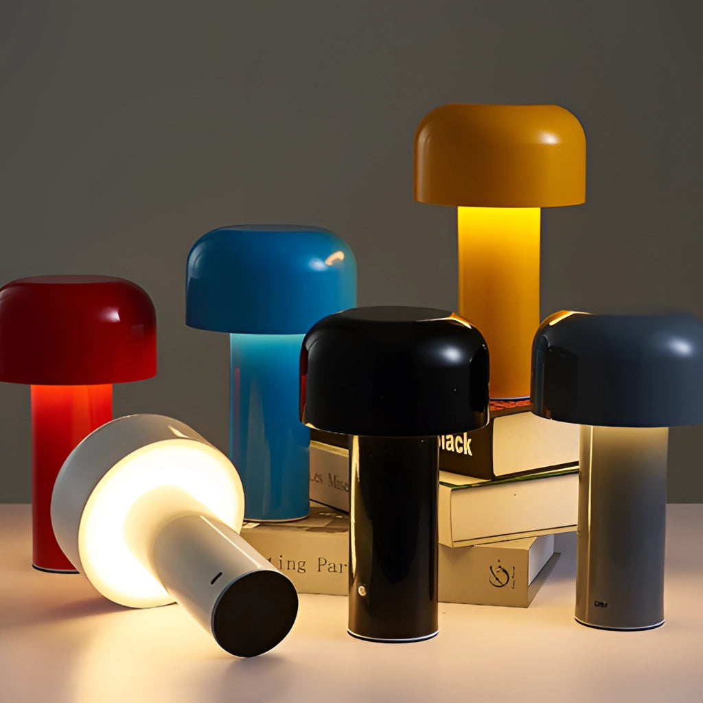 LED cordless table lamp with unique mushroom design placed on a modern table next to a chair.