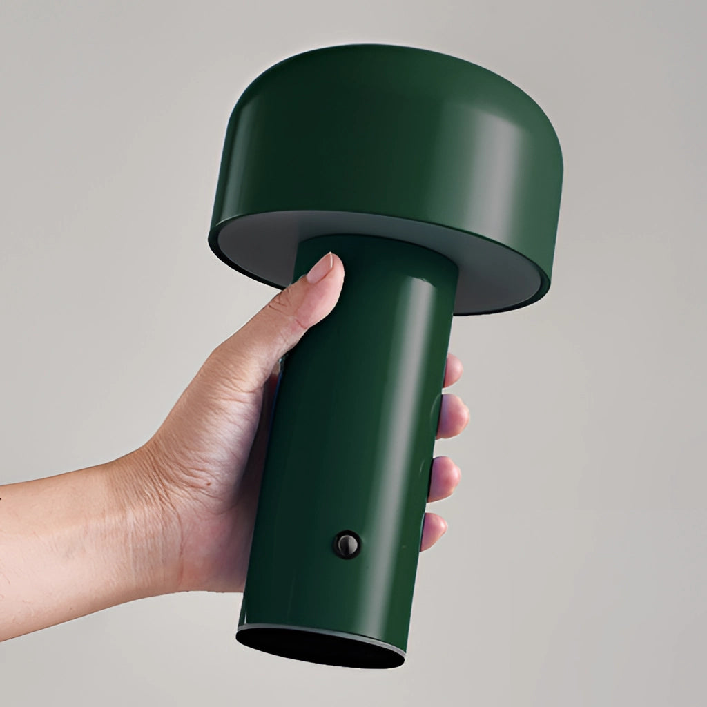 LED Cordless Table Lamp with Unique Mushroom Design in Evergreen color placed on a table, showcasing its sleek and modern light fixture.