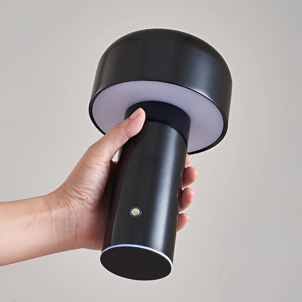 Black LED Cordless Table Lamp with Unique Mushroom Design on a white surface.