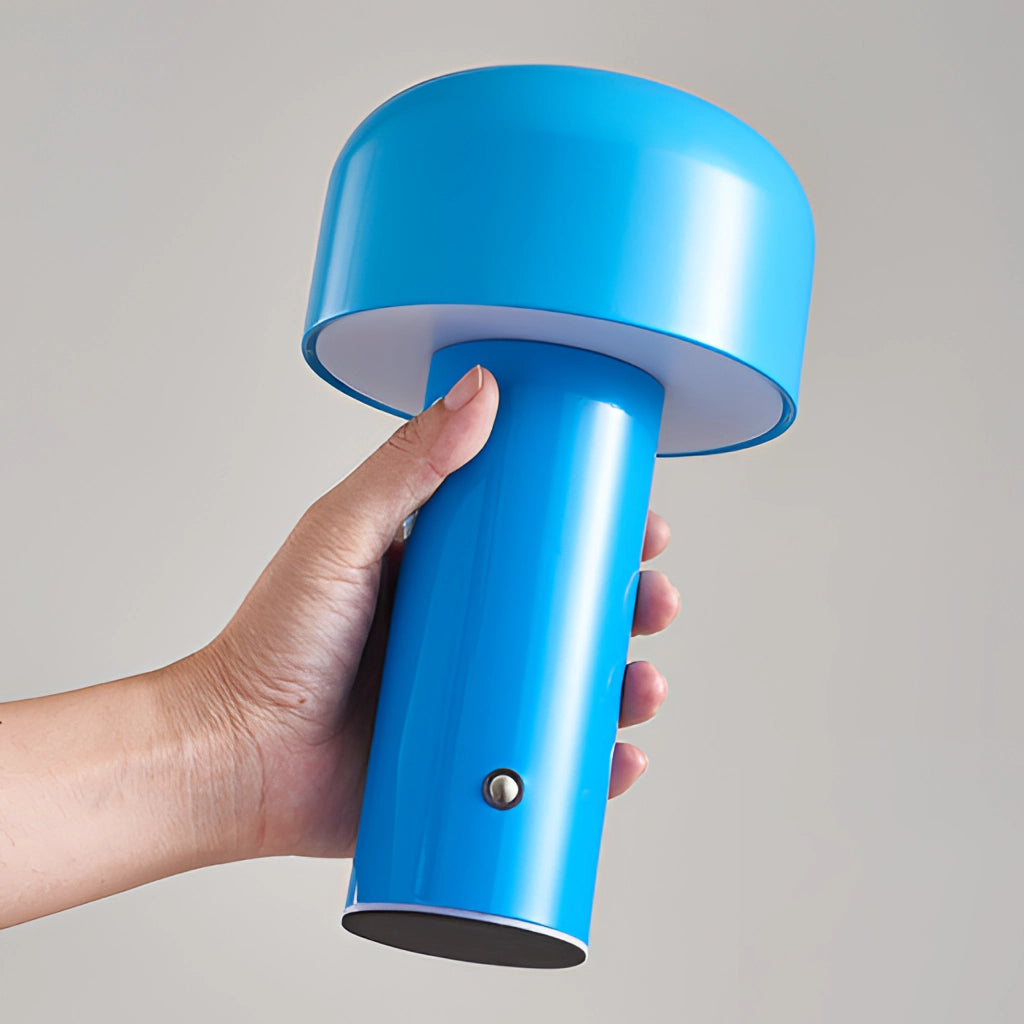 LED cordless table lamp with unique mushroom design in blue with transparent plastic elements.