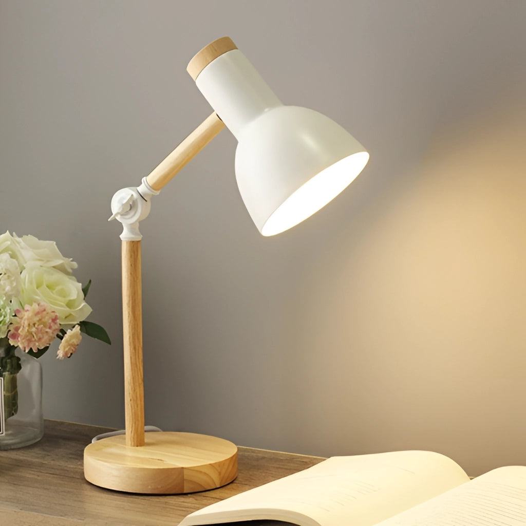 White LED desk lamp with Scandinavian minimalist design, featuring three color settings and a switch; displayed on a wooden desk with a small plant and minimalist decor.