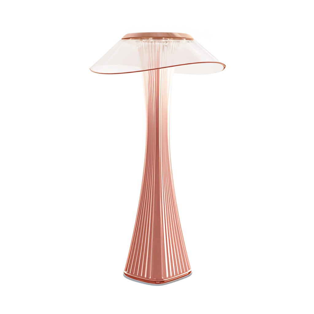 LED Diamond Desk Light in Crystal Lamp Design, Rosa Variant, featuring a diamond-shaped glass lampshade with a soft peach-pink hue, elegantly placed on a table.