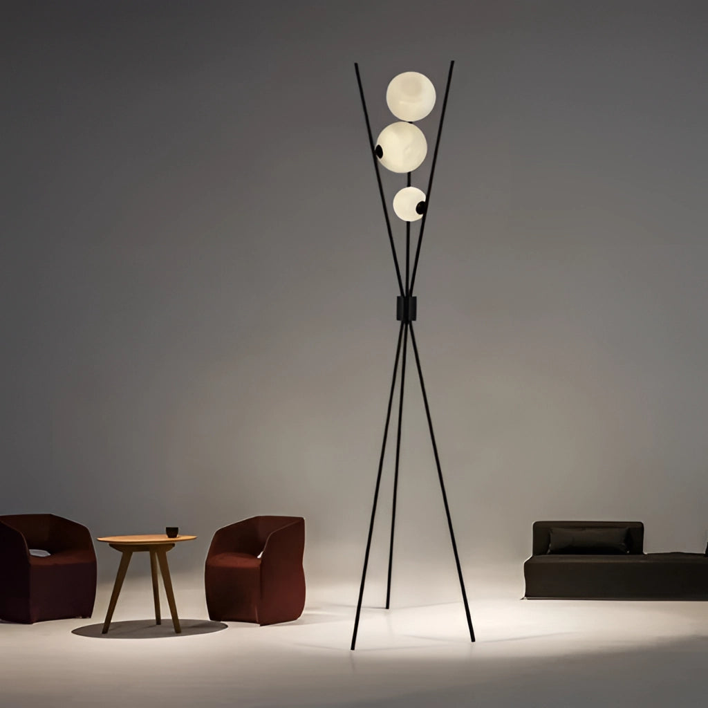 Modern LED moonlamp floor lamp in a contemporary living room setting, featuring wooden elements and ambient lighting, near a chair and table.