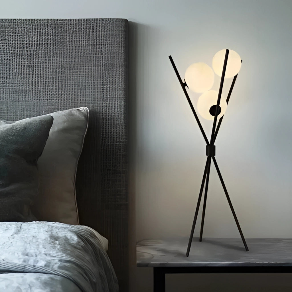 Modern LED Moonlamp table lamp with a sleek black and wood design, providing comfortable lighting; displayed in a stylish living room setting with contemporary furniture and decor.