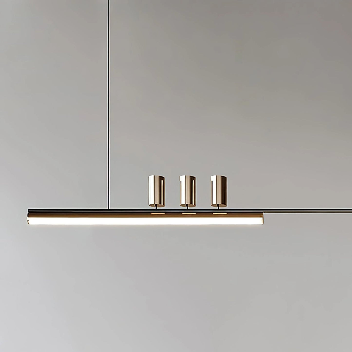 Nordic-inspired LED pendant light with a sleek rectangular design, adjustable wire, and warm and cool light options, hanging from a metal ceiling fixture.