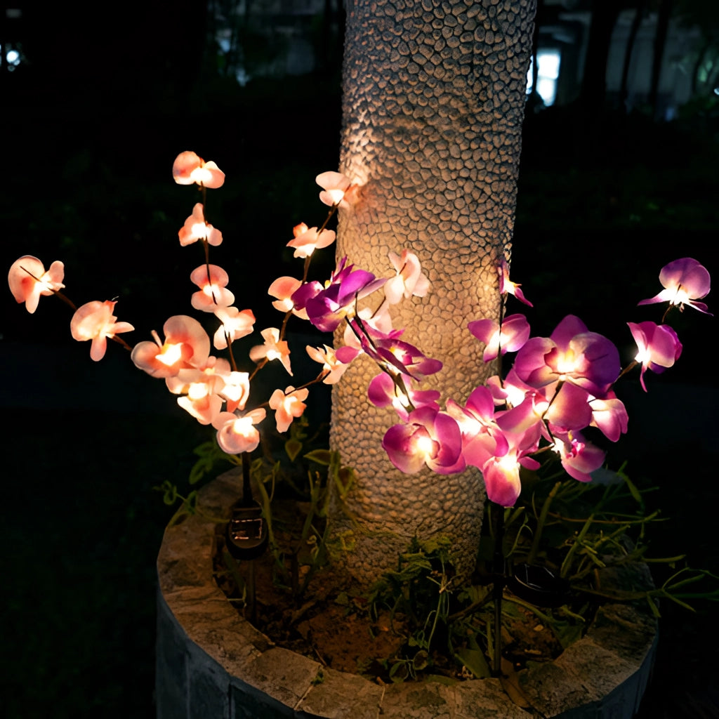 LED Solar Orchid Lights with Color Transition - Twin Pack featuring vibrant, realistic orchid flowers with petals illuminated by color-changing solar-powered lights, perfect for indoor or outdoor decoration.