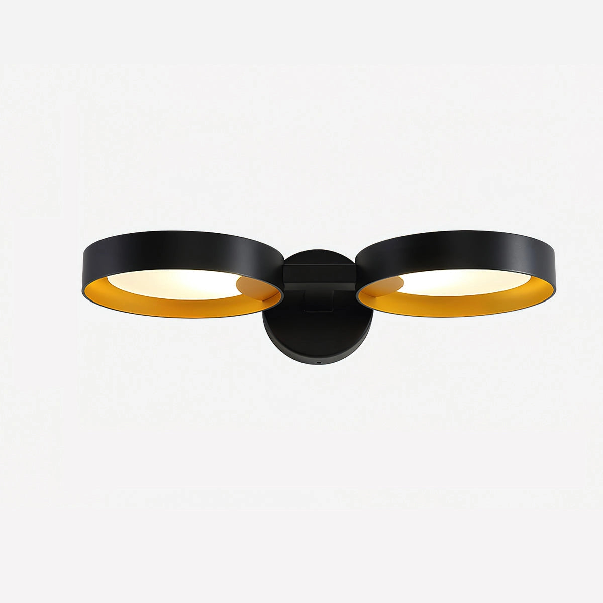 A set of two contemporary LED wall lights with an artistic black and orange design featuring double heads made of iron and acrylic, emitting a cool light.