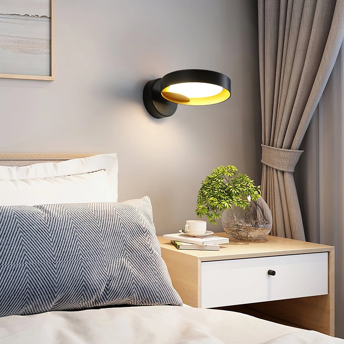 Contemporary iron and acrylic LED wall light with artistic design, mounted on a wall above a wooden console table with a potted plant and decorative items.
