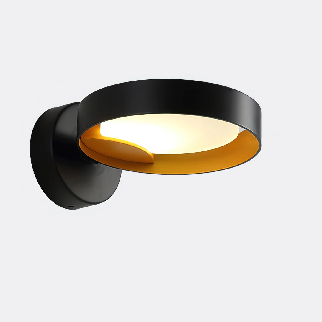 Contemporary LED wall light with artistic iron and acrylic design mounted on a wall.