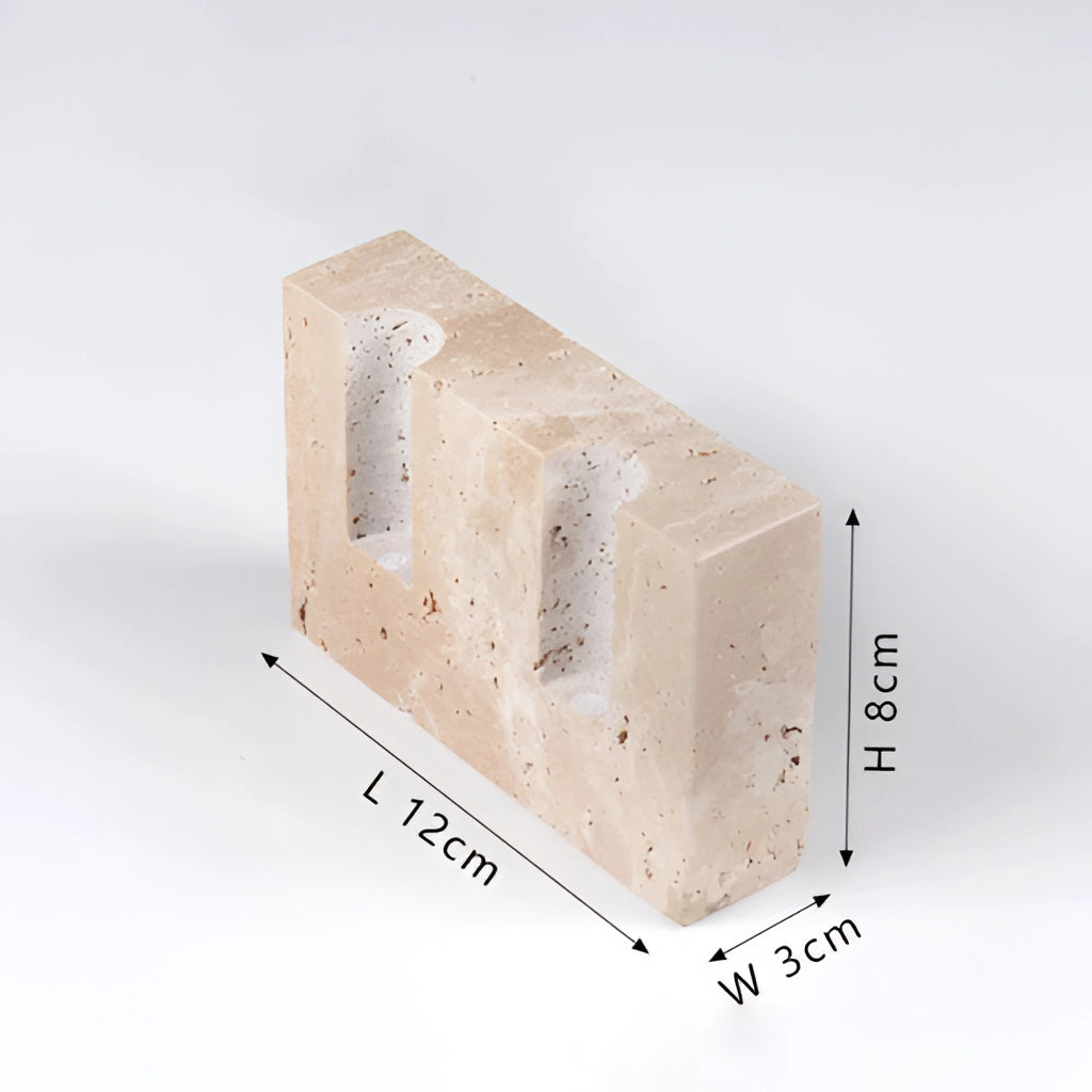 Marble candle holder for weddings and parties, rectangular shape with a sleek cut design, transparent accents, and metallic elements.