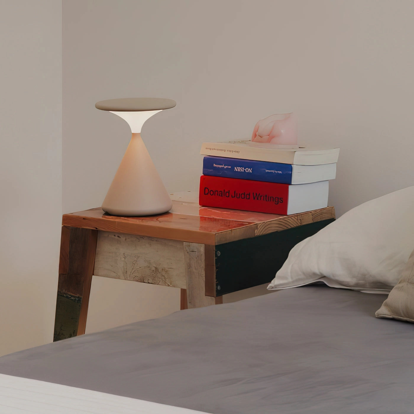 Outdoor Cordless Lamp for Portable Ambiance - Selene, placed on a wooden table, showcasing its elegant and versatile design.