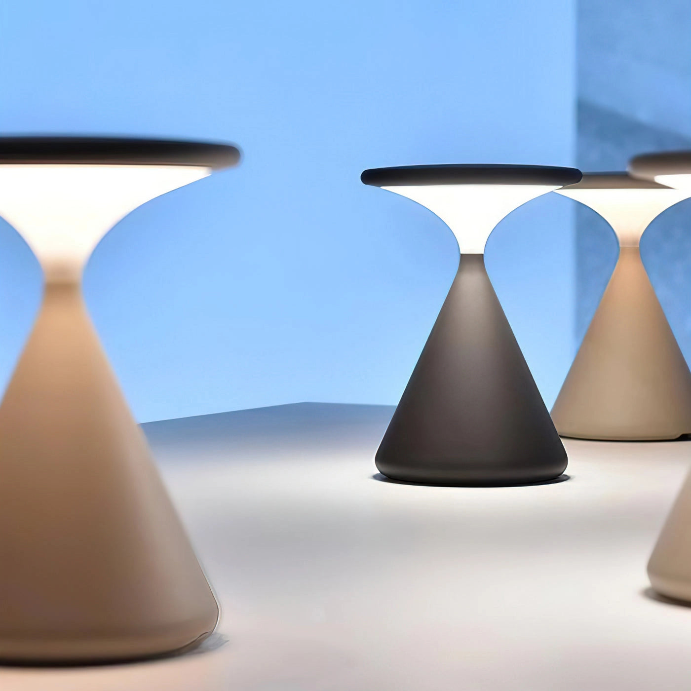 Elegant Selene outdoor cordless lamp on a table, providing versatile ambient light in a stylish design.