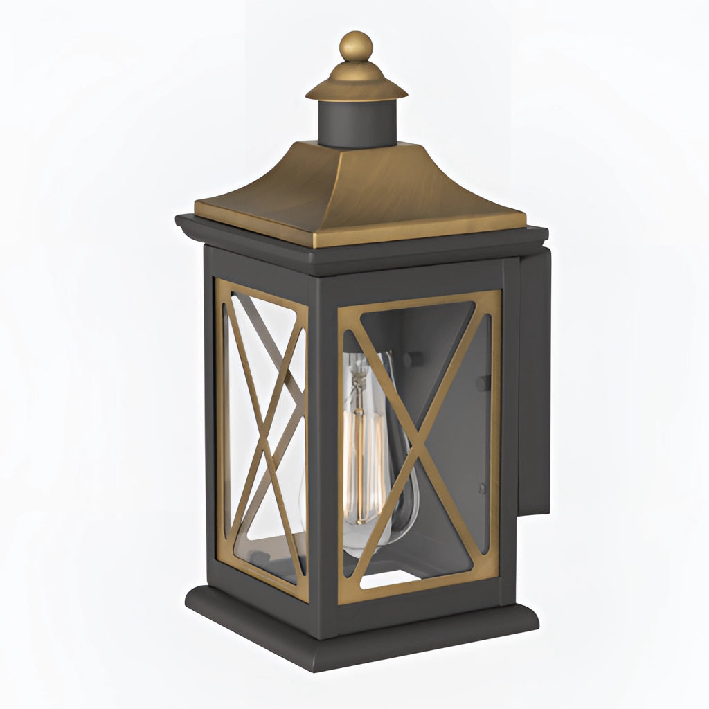 Vintage bronze candle wall sconce mounted on an exterior wooden facade, featuring a rectangular glass and metal design reminiscent of a classic street light.