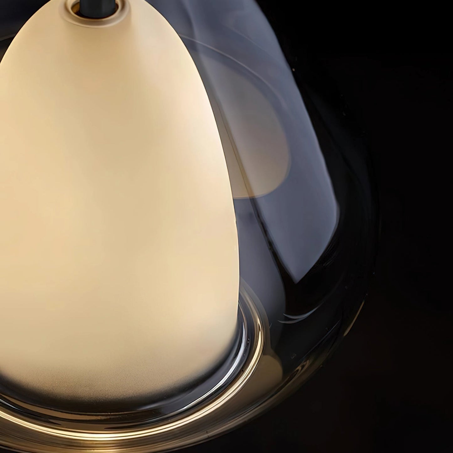 Pendant lamp with clear raindrop design and starlight effect in Nordic style hanging from the ceiling.