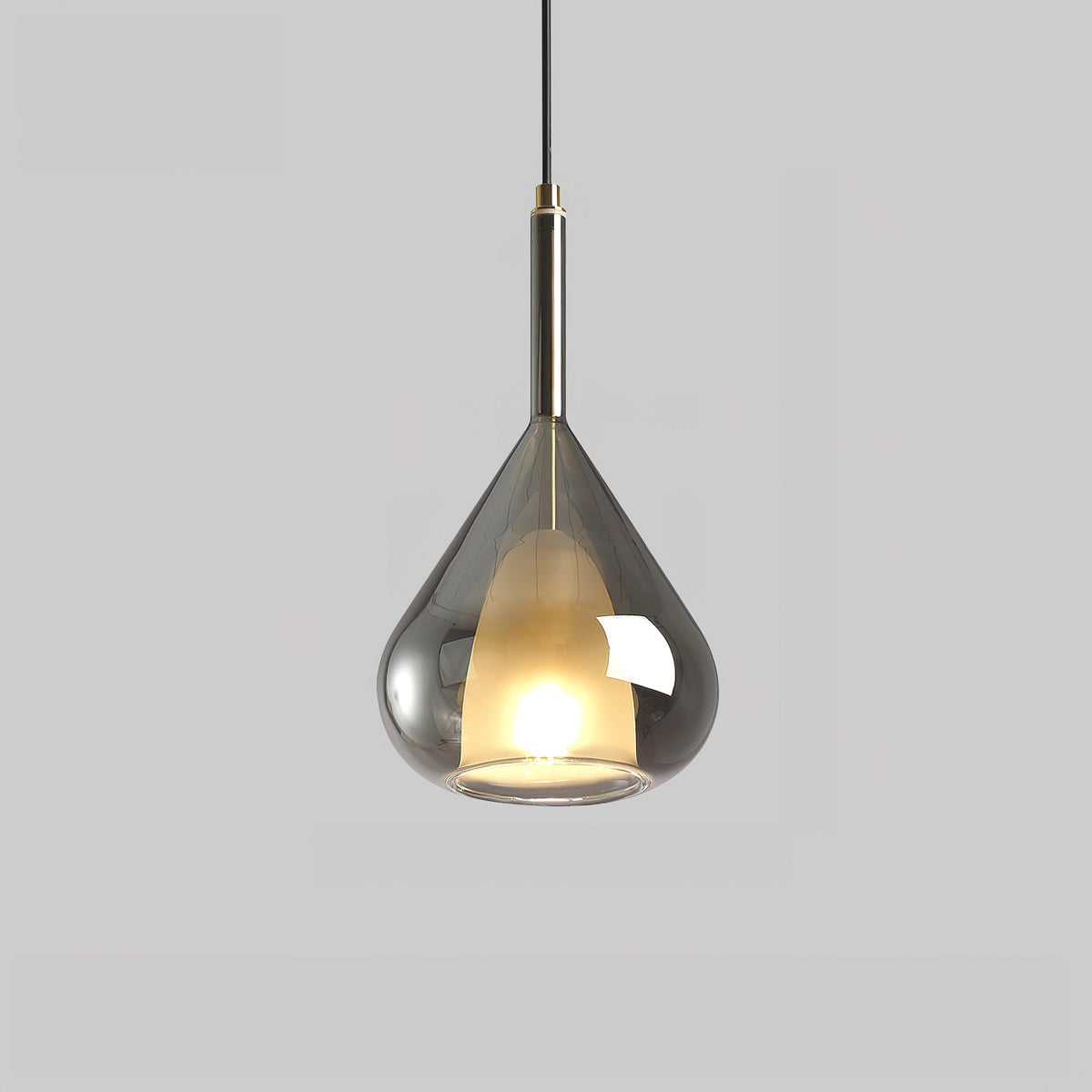 Nordic style pendant lamp with clear raindrop design and starlight effect in smoke gray, measuring ∅ 7.9″ x H 14.7″, hanging from a wooden ceiling with a soft glow illuminating a table below.
