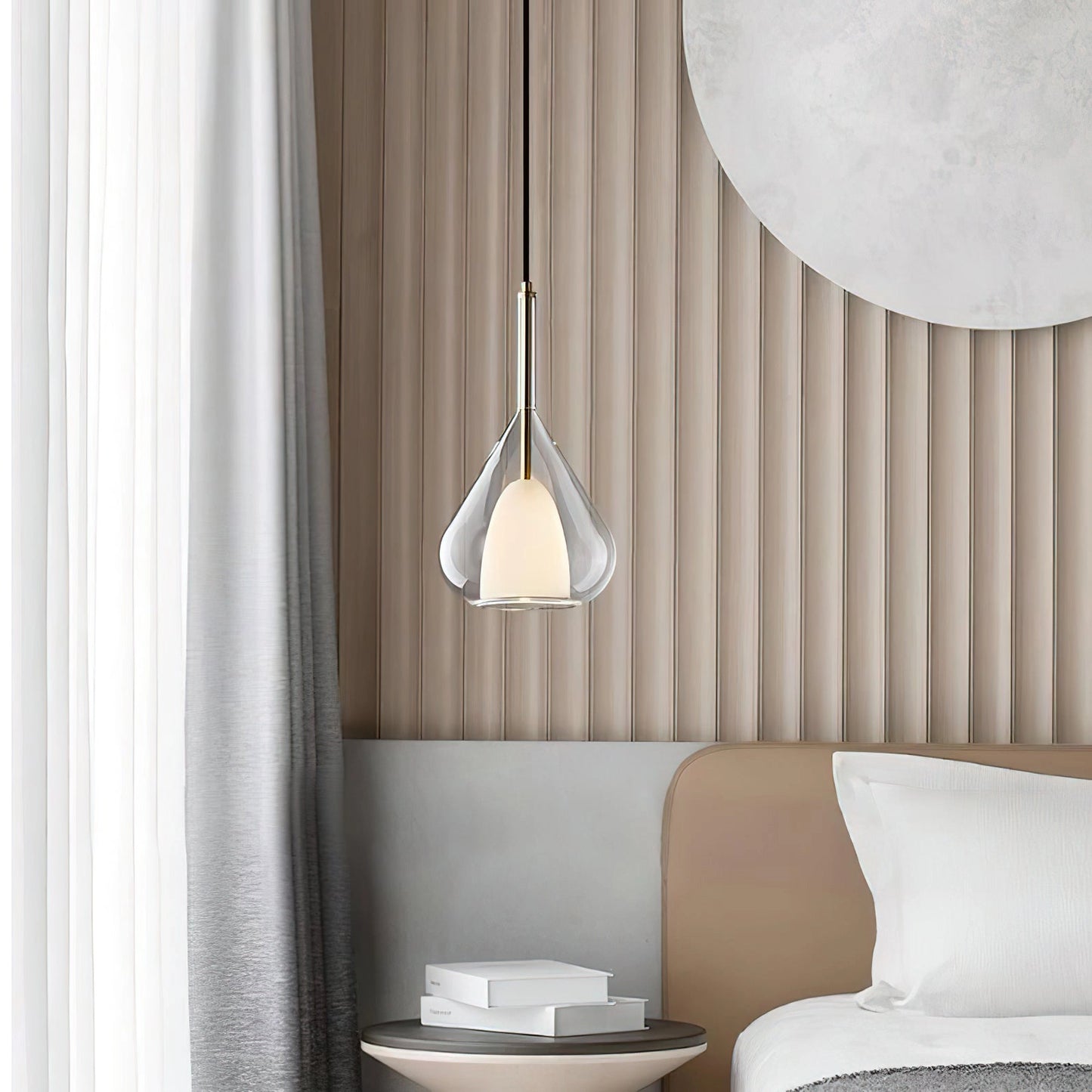 Nordic style pendant lamp with clear raindrop design and starlight effect, featuring a wooden accent and grey textile shade, illuminating a modern interior space.