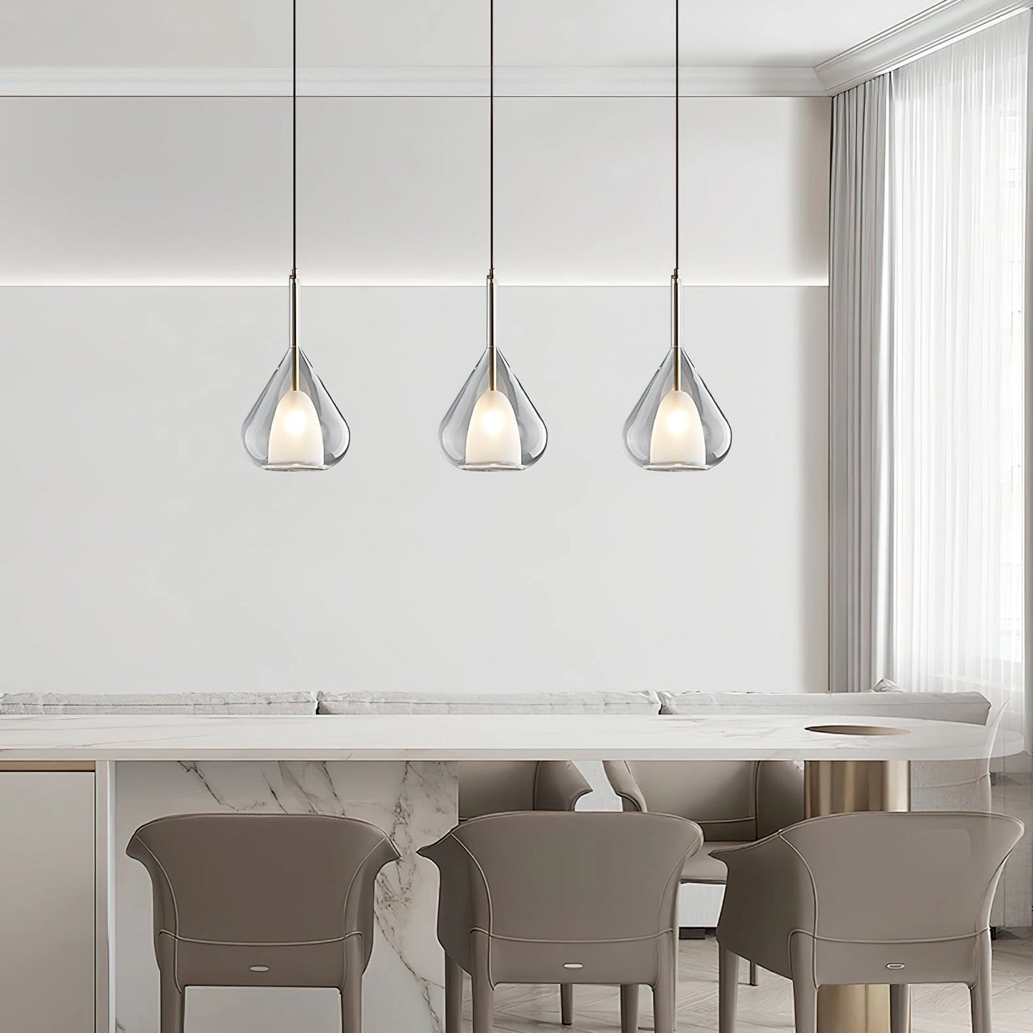 Nordic style pendant lamp with a clear raindrop design and starlight effect, hanging above a wooden table with white chairs in a modern interior setting.