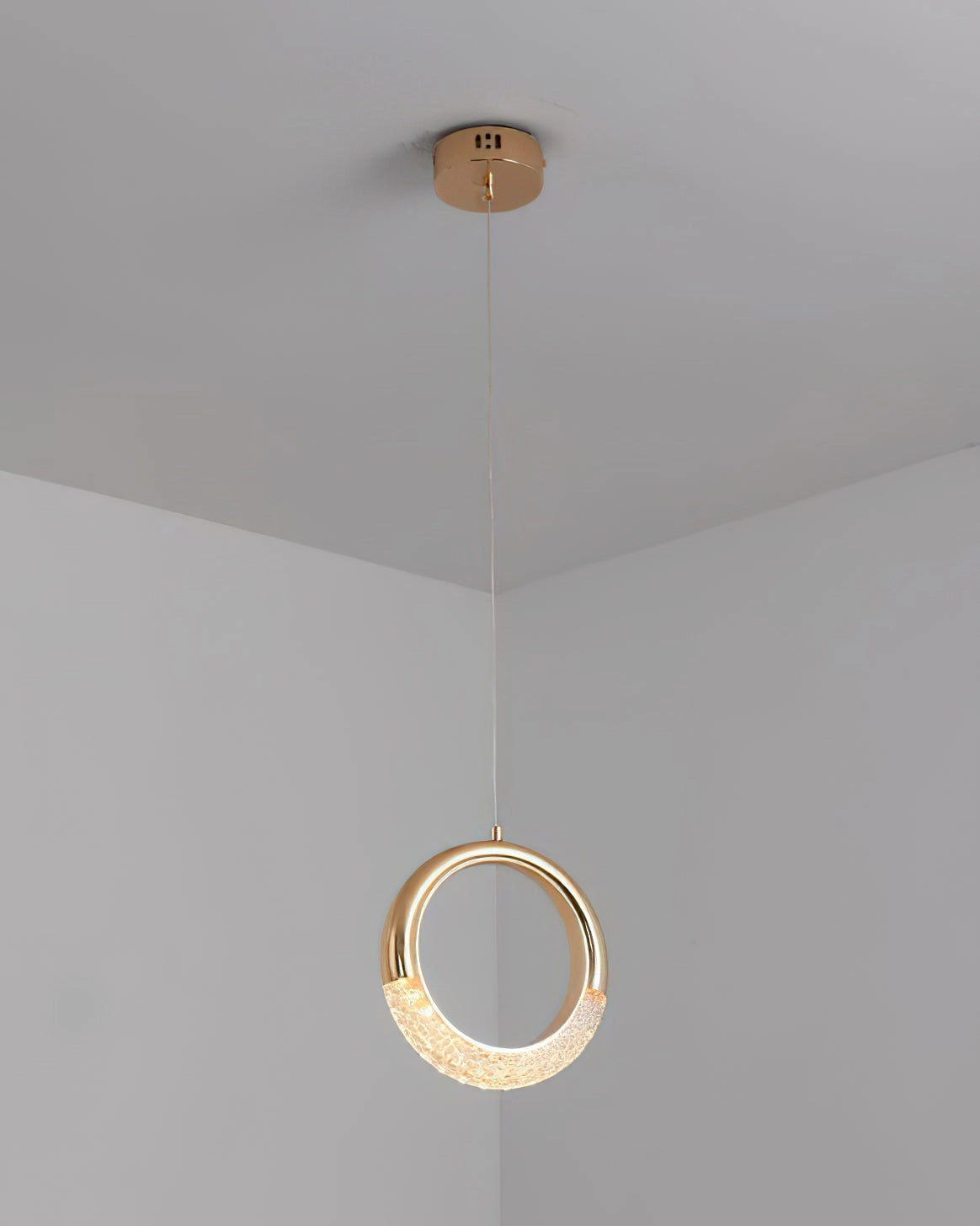 Modern Pendant Lamp Dante chandelier with a circular and oval design, featuring beige and wood tones, suspended from the ceiling with metal and plaster elements.