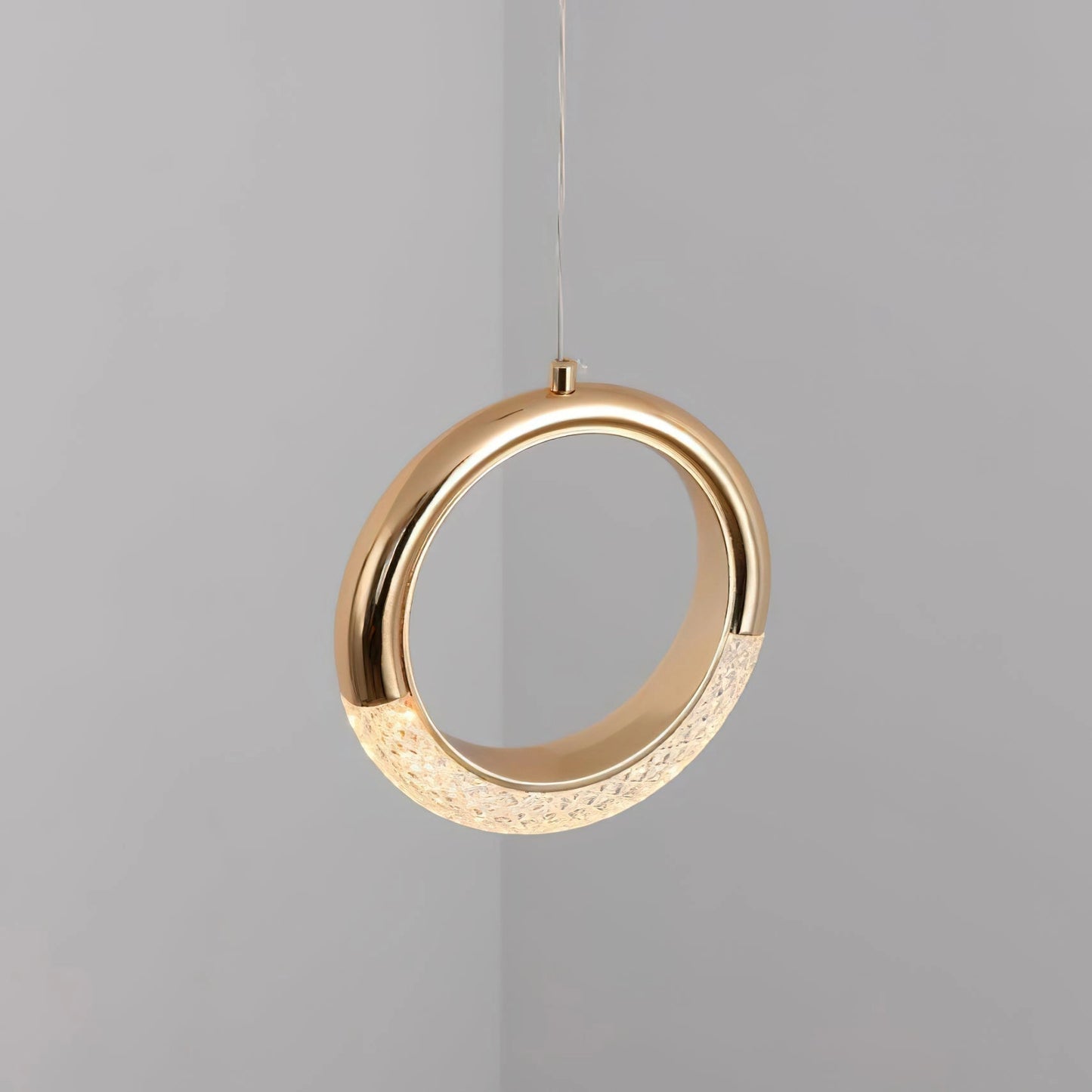 Modern Pendant Lamp Dante Chandelier in gold and wood with an oval and circular design elements.