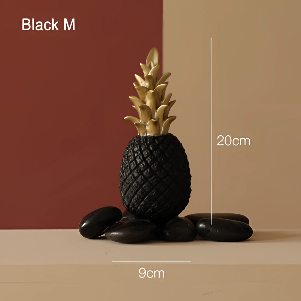 Golden resin pineapple-shaped ornament for home decor in black medium size.