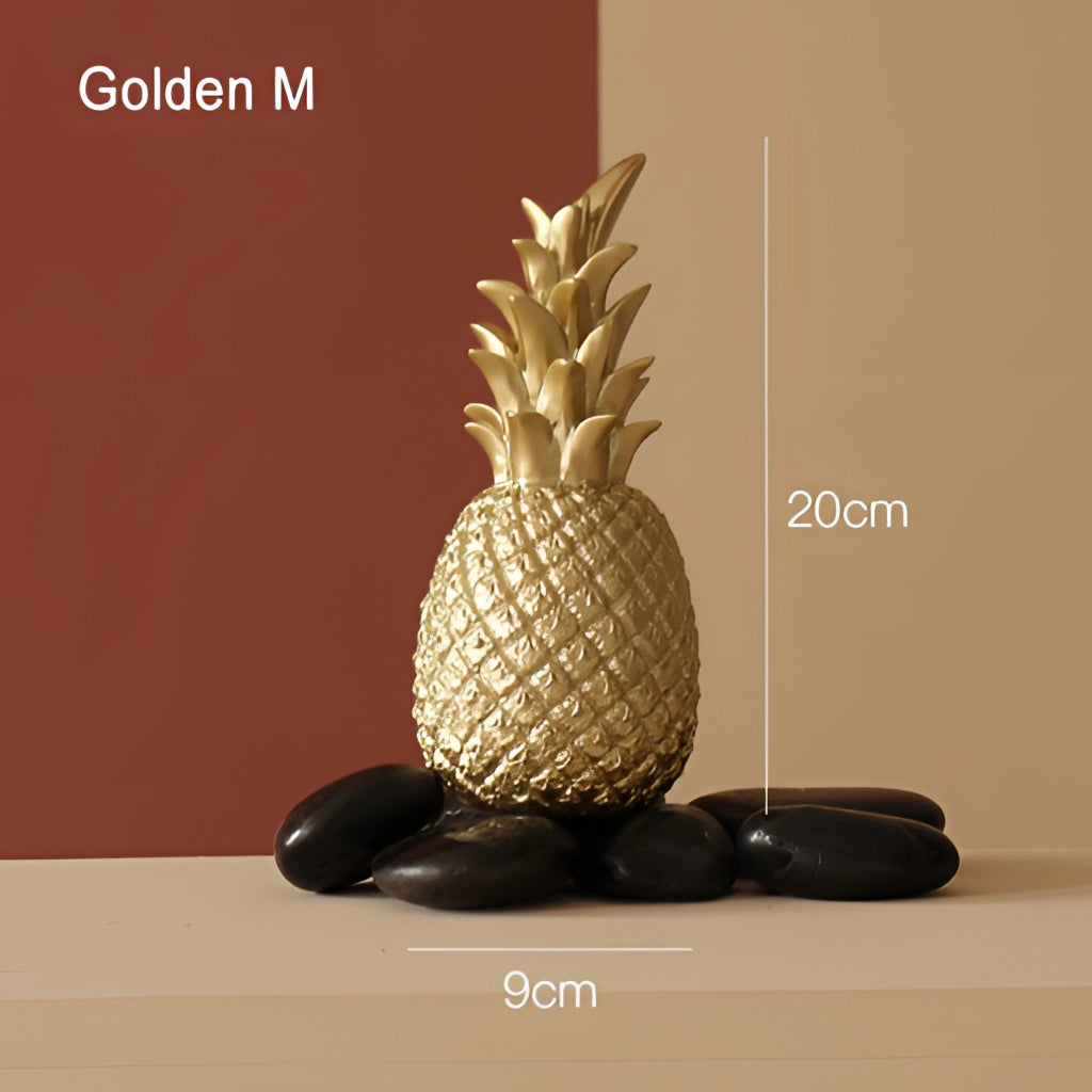 Golden resin pineapple ornament designed in a Nordic style, ideal for home decor.
