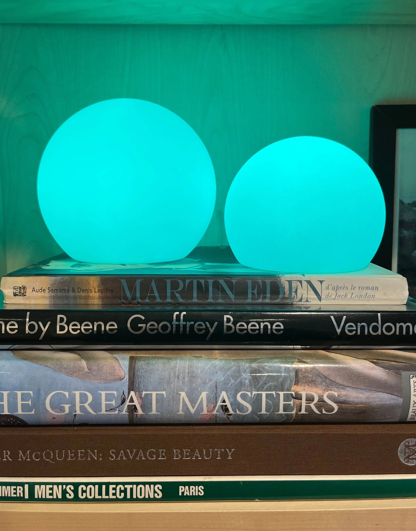 Rechargeable Cordless LED Moon Table Lamp with 16 color options displayed on a wooden table in a room.