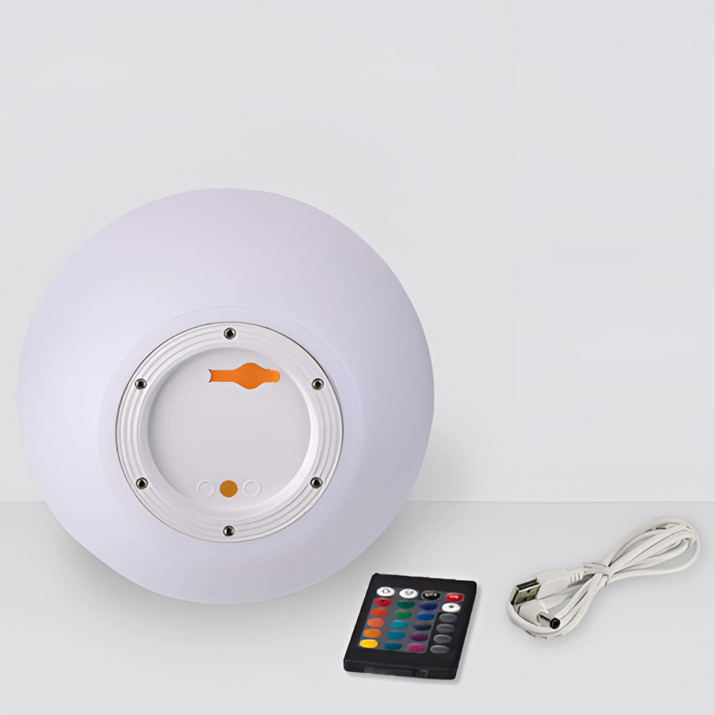 Rechargeable cordless LED moon table lamp with 16 color options, circular design, positioned on a table.