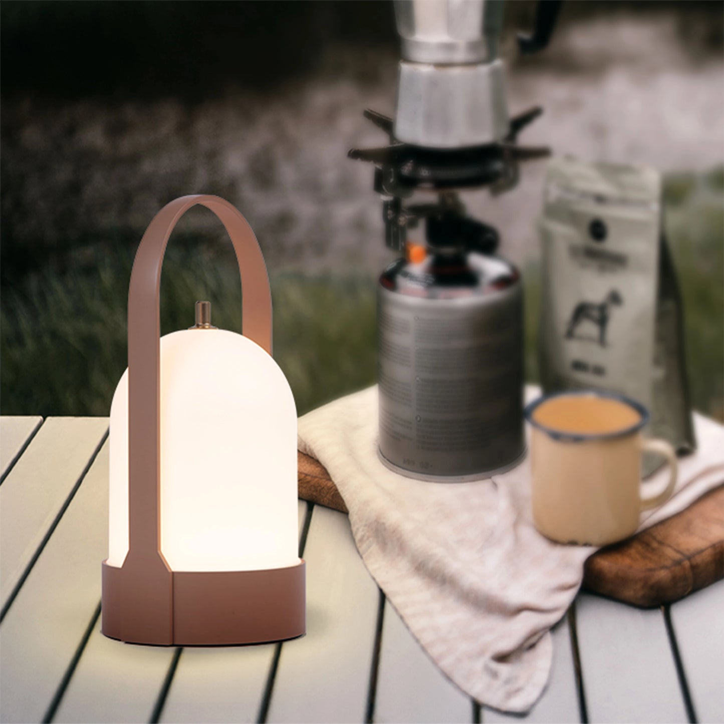 Rechargeable table lamp with touch dimming feature on a wooden table.