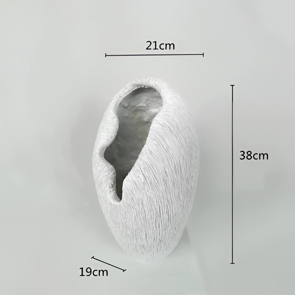 Decorative resin bowl with nature-inspired design, featuring a monochrome color scheme and circular shape, resembling natural elements.