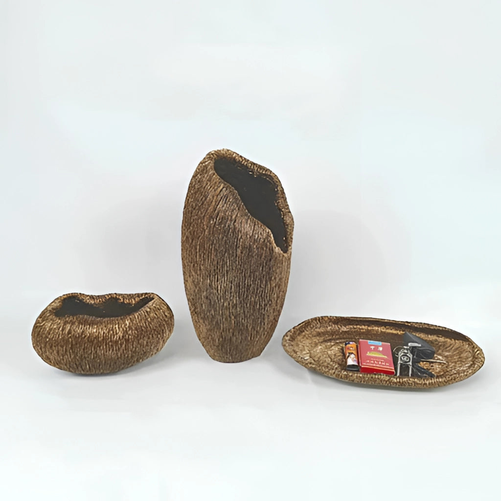 A nature-inspired decorative bowl made of resin with intricate wood-like textures and circular design elements.