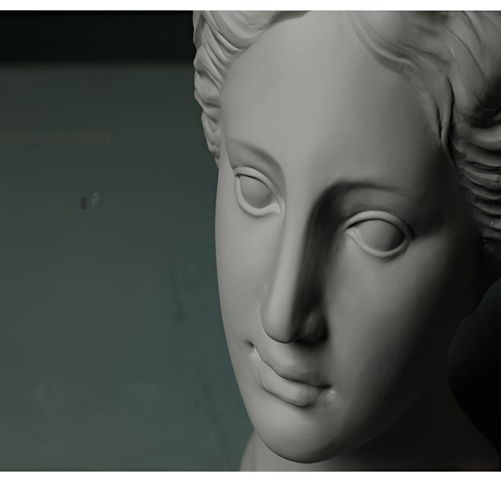 Resin Neoclassical Venus Vase in Blush Pink, depicting a detailed classical sculpture of Venus's face and neck.