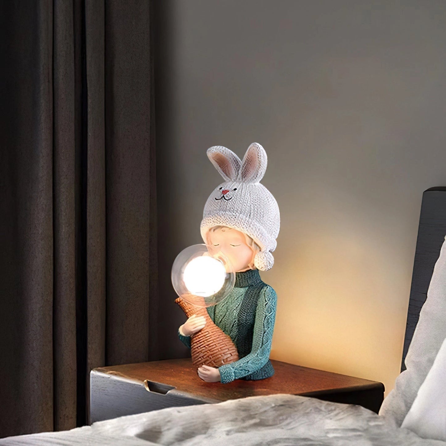 Resin table lamp featuring an elegant rabbit girl figure with dual glass lampshades, set in a cozy room with wooden elements, curtain-draped windows, and artistic interior design.