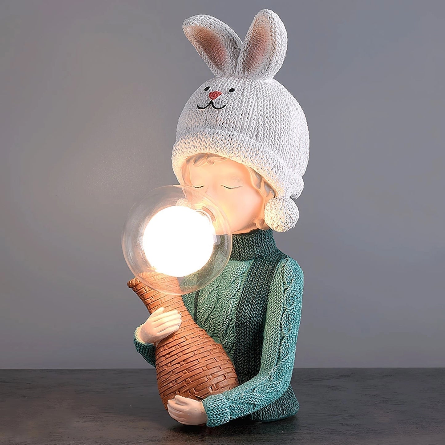 A resin table lamp featuring an elegant rabbit girl figure with dual glass lampshades, detailed with human-like features such as head, hands, and arms, accessorized with a cap and costume hat.