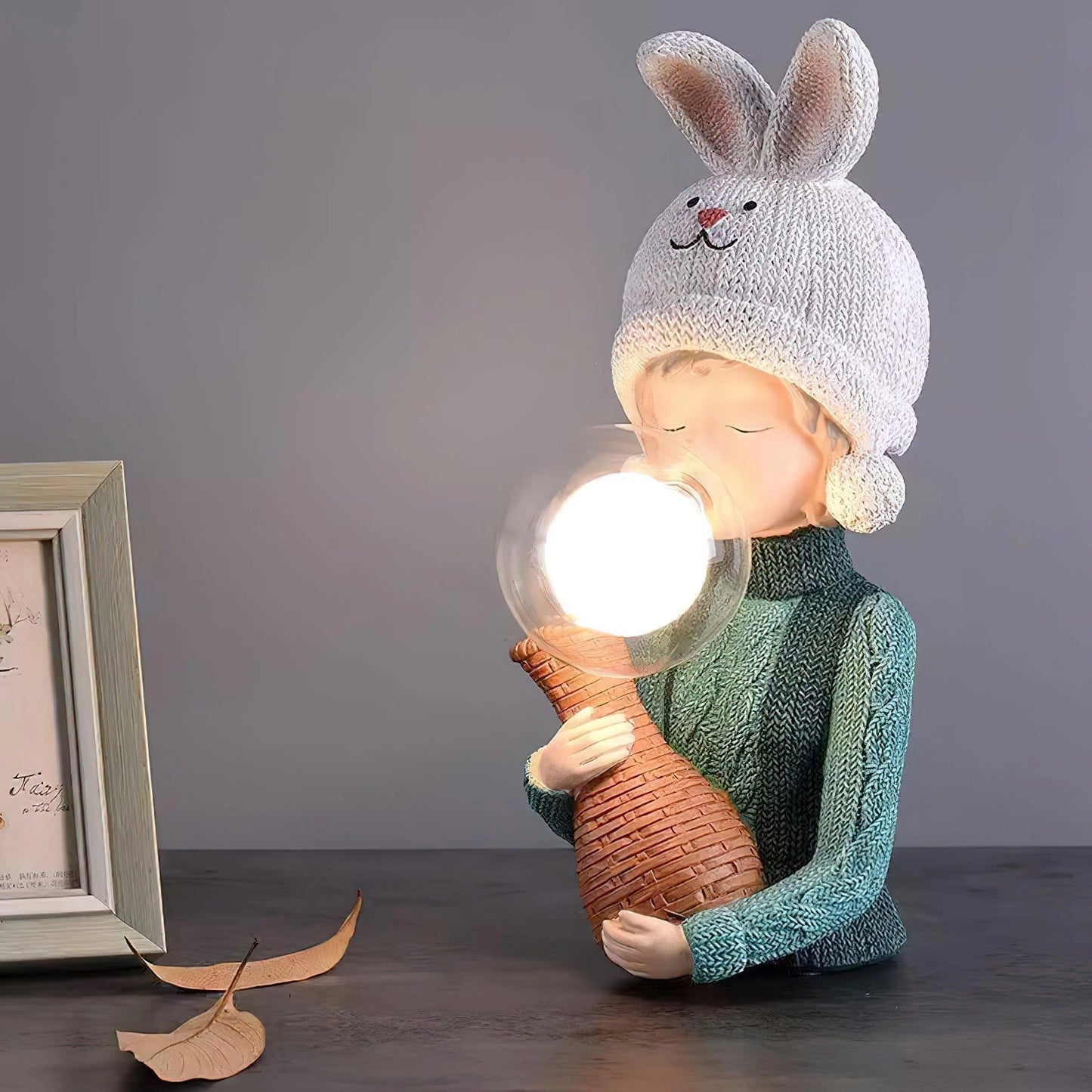 Resin table lamp featuring an elegant rabbit girl with dual glass lampshades, wearing a fashionable costume hat.