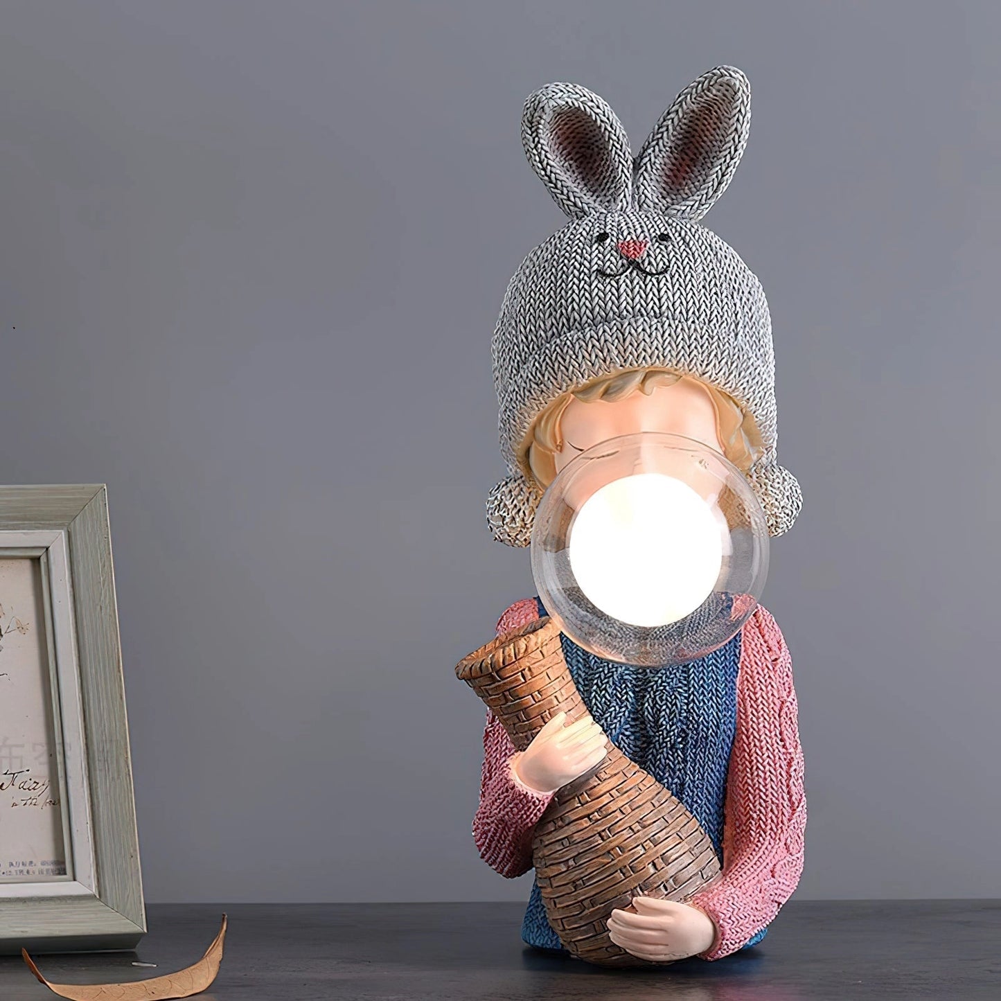 Resin table lamp depicting an elegant rabbit girl holding dual glass lampshades, showcasing intricate details and a whimsical design.