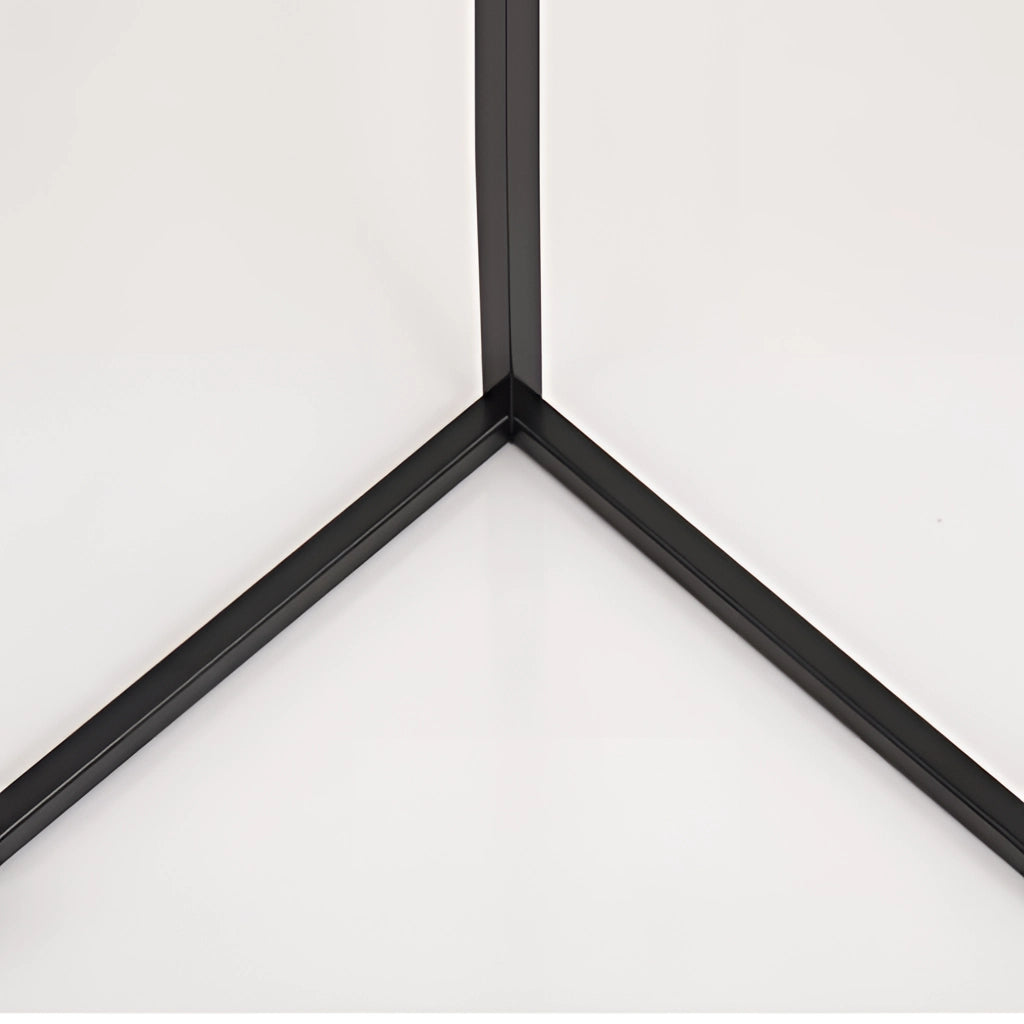 A modern RGB corner floor lamp with LED light and remote control, featuring a sleek, triangular design and a minimalist metal and composite material build.
